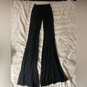 Pretty little thing long black flared yoga pants size US 8